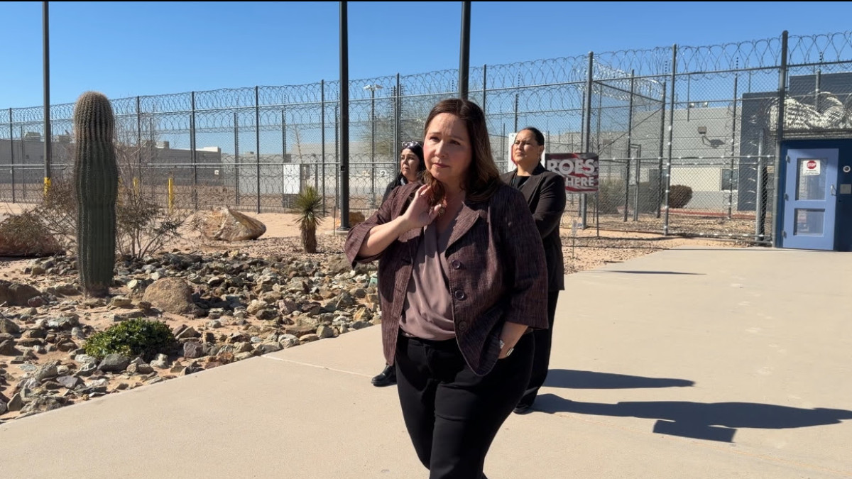 Rep Grijalva walking outside of Eloy detention facility
