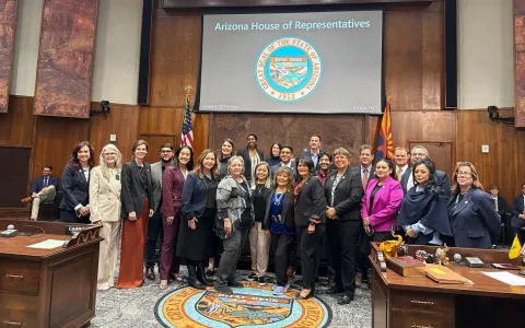 Adelita on the State House Floor with Members of the House
